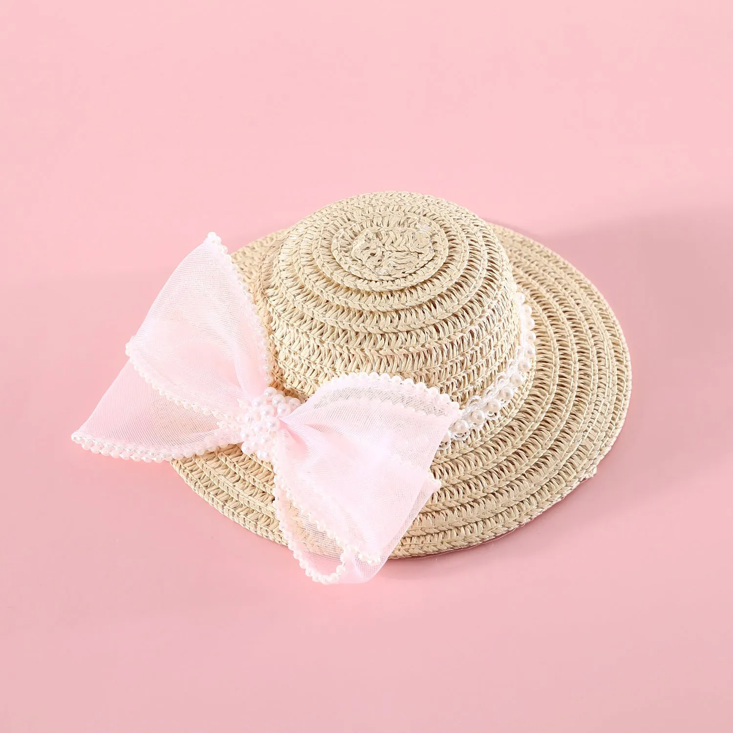 Woven straw cat hat with a pearl bow, shown in blue, pink, purple, and white colour options