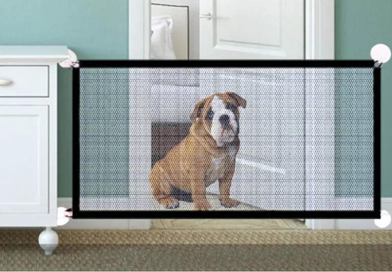 Black foldable cloth pet fence for dogs, placed indoors near doorway