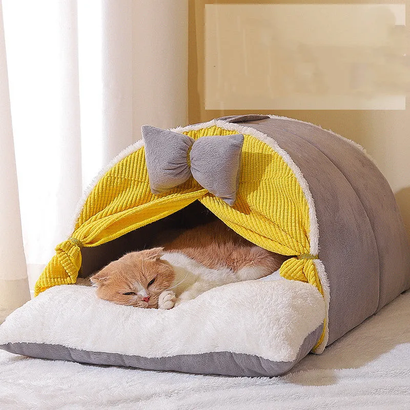 Semi-enclosed cat nest in creamy yellow cloth with grey mat, suitable for all-season indoor use