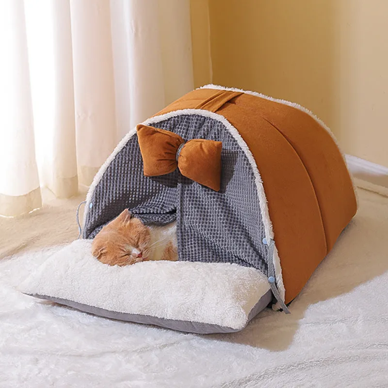 Semi-enclosed cat nest in creamy yellow cloth with grey mat, suitable for all-season indoor use