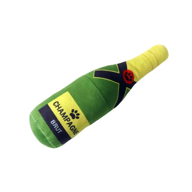 Plush wine bottle dog toy in green with squeaker and crinkle material for interactive play