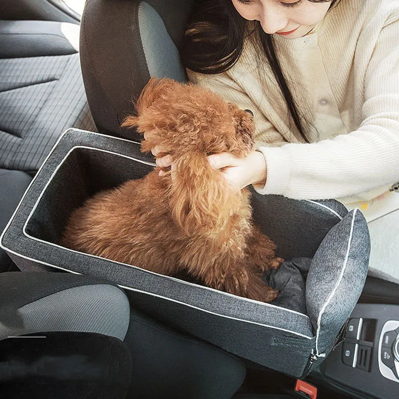 Gray car pet bed with adjustable pillow on car seat for dogs and cats