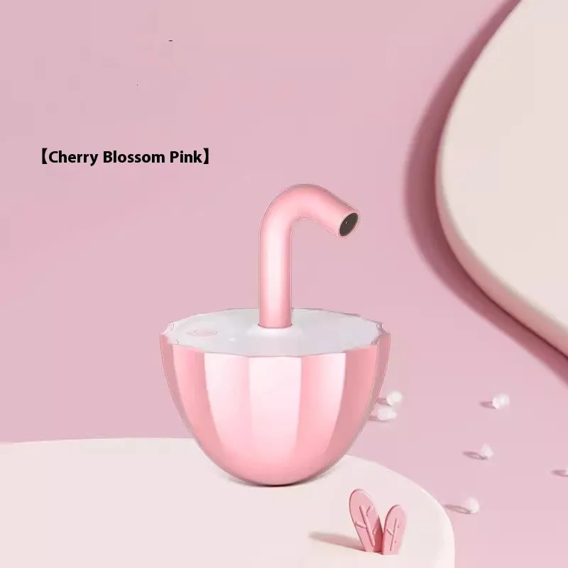 Bubble tea cup shaped interactive laser cat toy with cherry blossom pink finish on floor