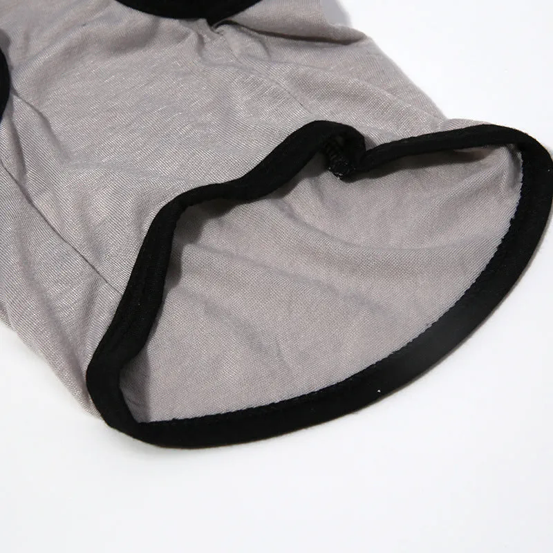Grey dacron pet vest for dogs and cats, casual style, shown on a small pet with five size options from XS to XL