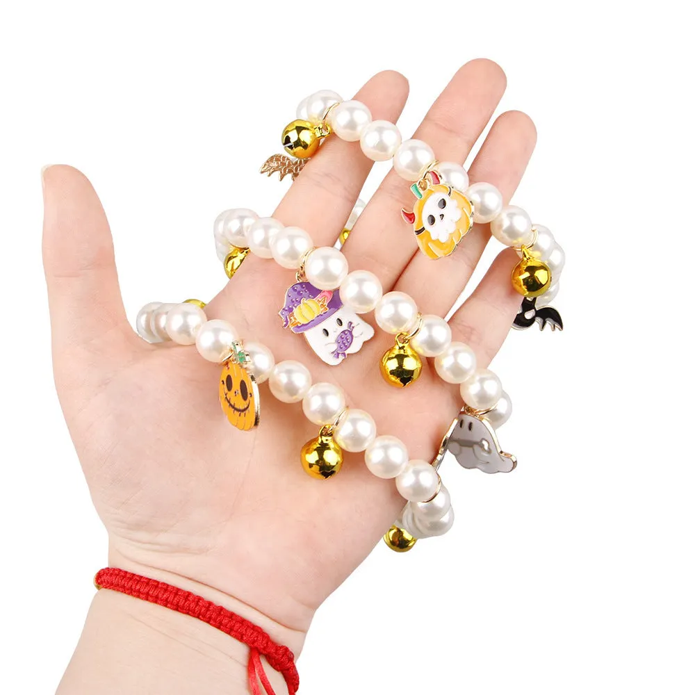 Halloween pet collar with simulated pearls and a purple ghost pumpkin charm around a cat's neck.