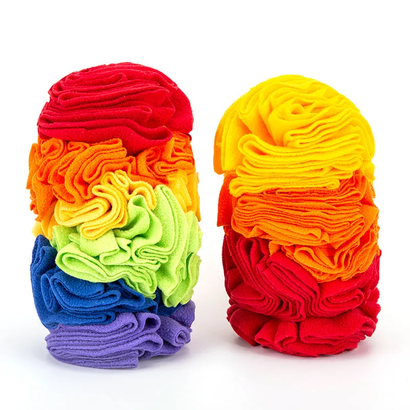 Dog snuffle pad made of polar fleece fabric in rainbow colour, 25x15cm, lying flat on floor