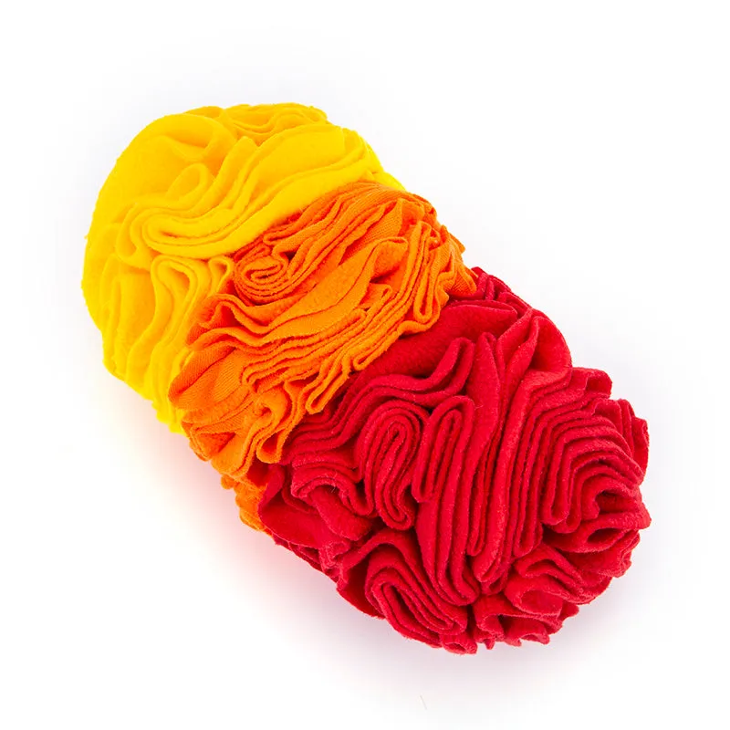 Dog snuffle pad made of polar fleece fabric in rainbow colour, 25x15cm, lying flat on floor