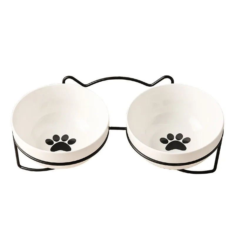 Ceramic cat bowl with iron frame stand in cat footprints pattern