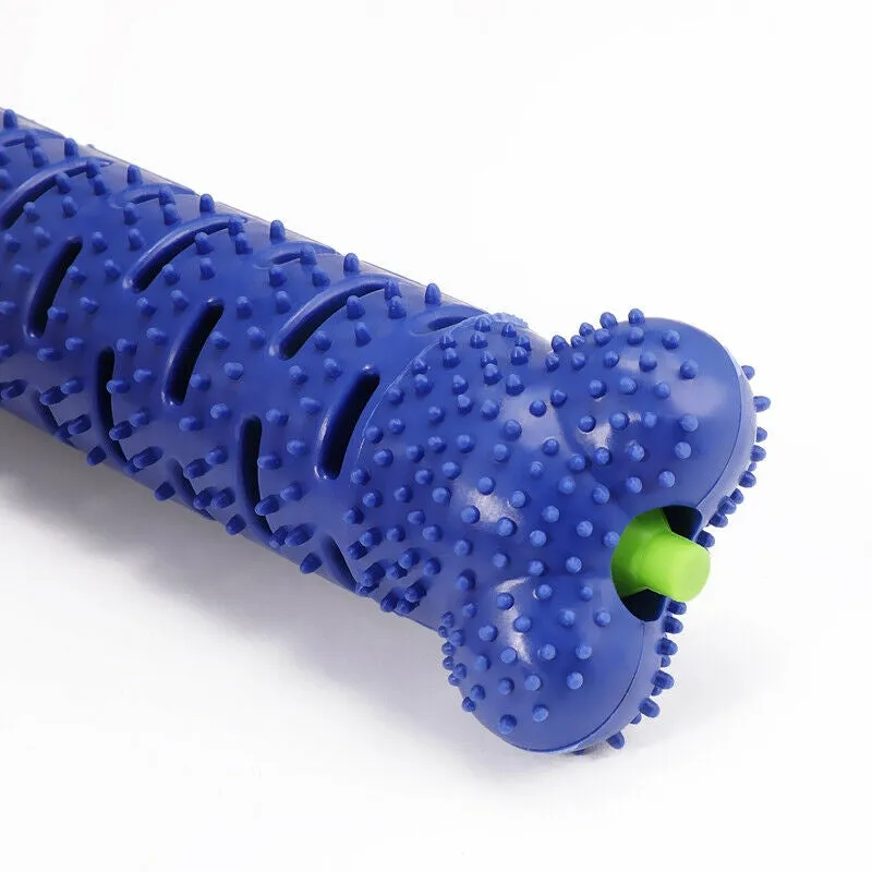 Blue silicone dog chew toy toothbrush with treat dispenser on white background