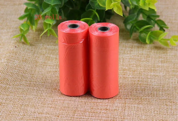 Bone-shaped pet garbage bag dispenser in new PP material, 8cm long and 5cm wide, on a table