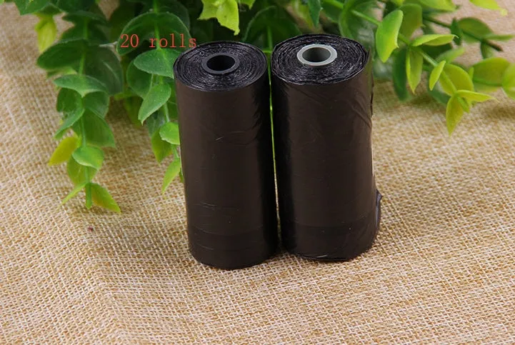 Bone-shaped pet garbage bag dispenser in new PP material, 8cm long and 5cm wide, on a table