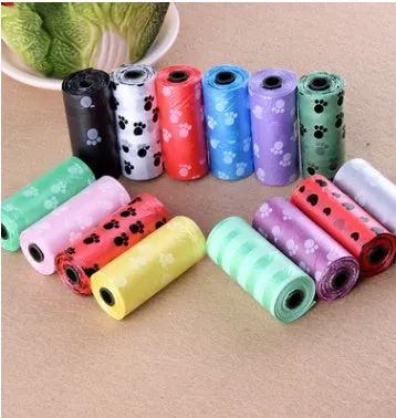 Bone-shaped pet garbage bag dispenser in new PP material, 8cm long and 5cm wide, on a table