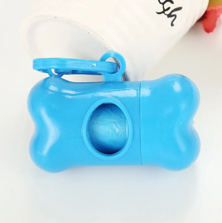 Bone-shaped pet garbage bag dispenser in new PP material, 8cm long and 5cm wide, on a table