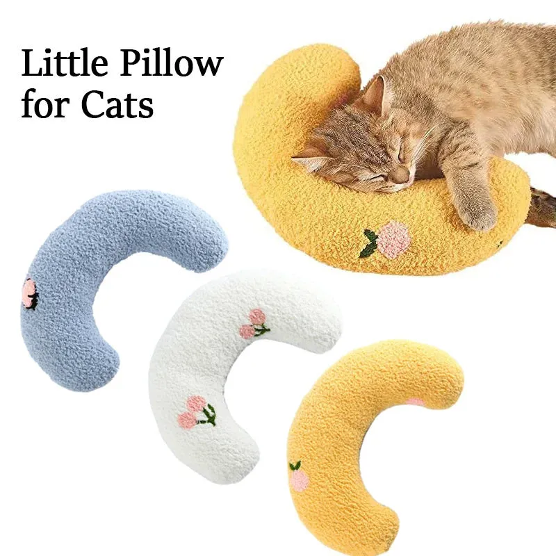 Soft quilted U-shaped cat pillow in blue, 26x18cm, on a clean white background
