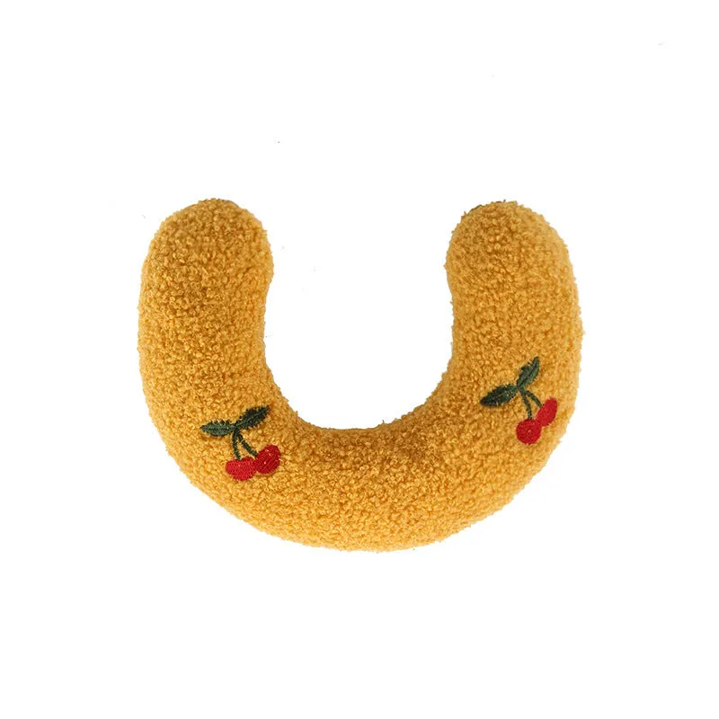 Soft quilted U-shaped cat pillow in blue, 26x18cm, on a clean white background