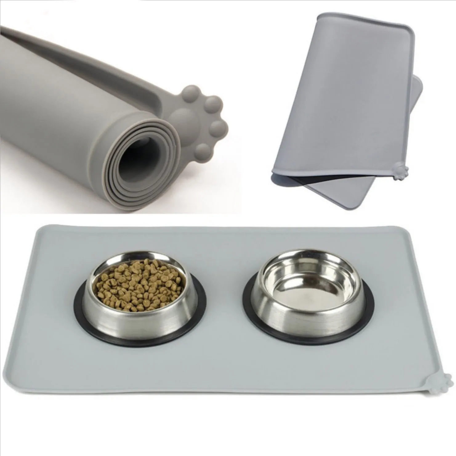 Grey waterproof silicone pet mat with raised edges and a non-slip base, measuring 47x29.5cm, placed under two pet bowls