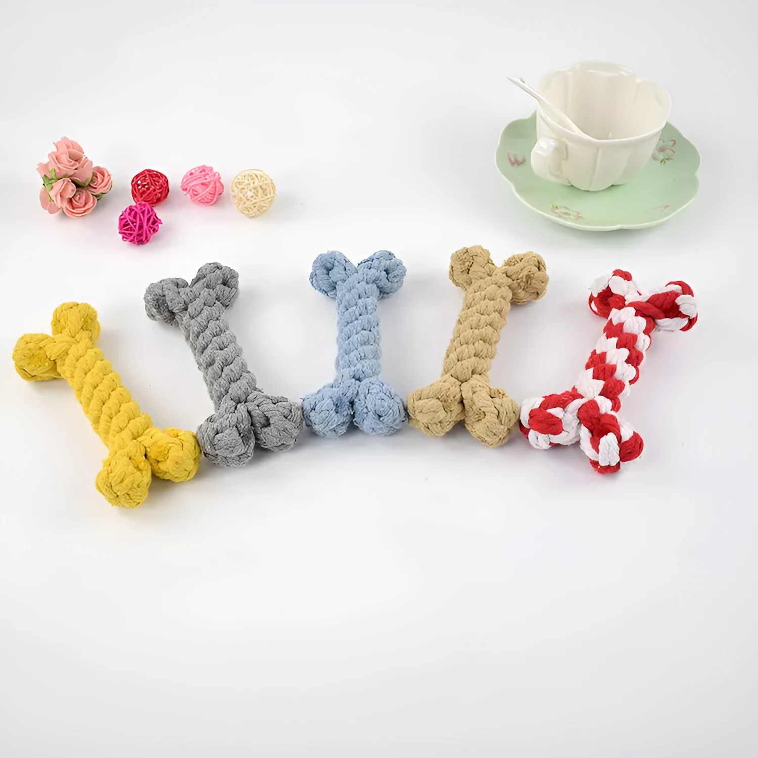 Cotton rope knot dog bone toy approximately 15cm long in blue colour on white background