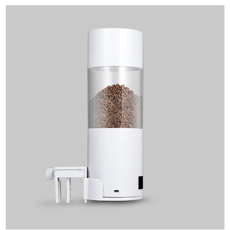 White ABS automatic fish feeder for aquarium, 9x9x18cm, with 24-hour timer and USB cable