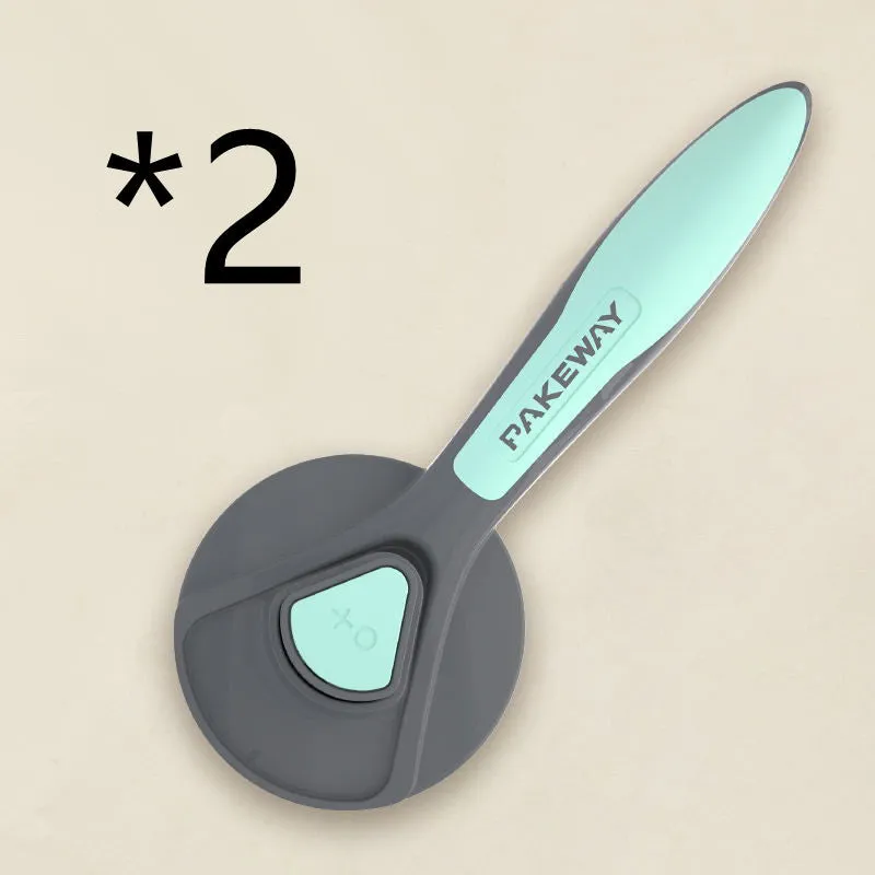 Pet floating hair combing brush in mint green, engineering plastic handle, 193mm length on white background