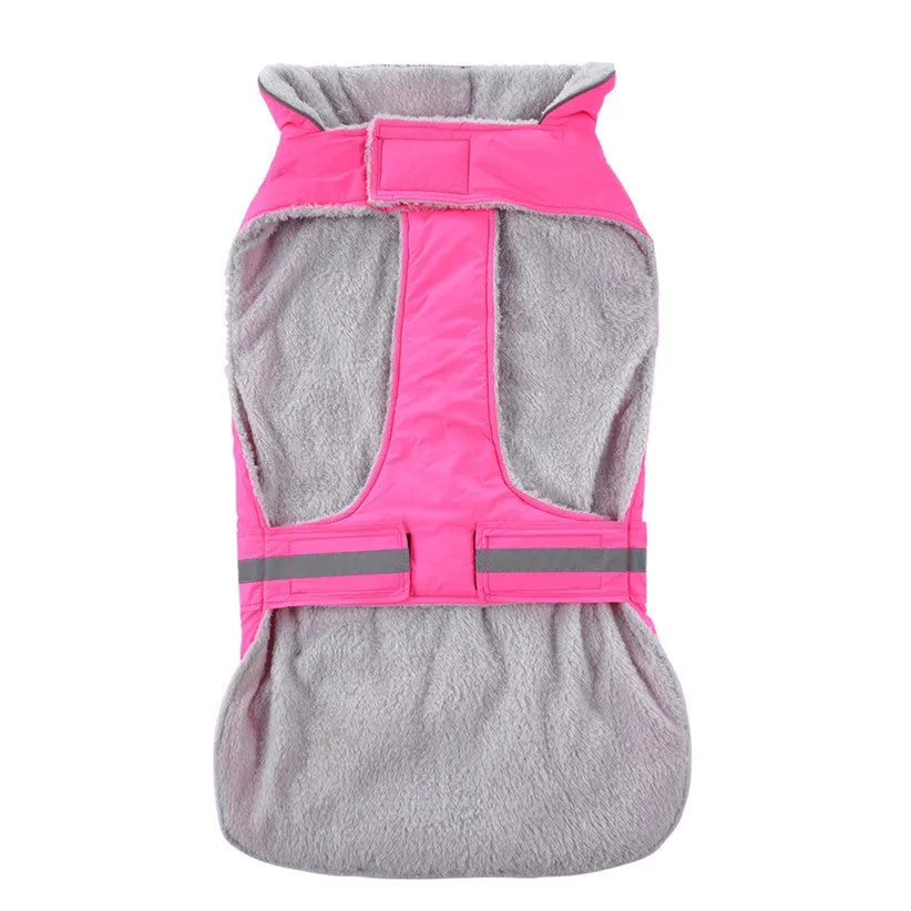 Reflective winter dog coat in pink, with harness holes, lay flat