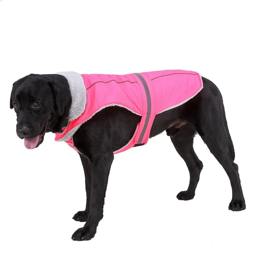 Reflective winter dog coat in pink, with harness holes, lay flat