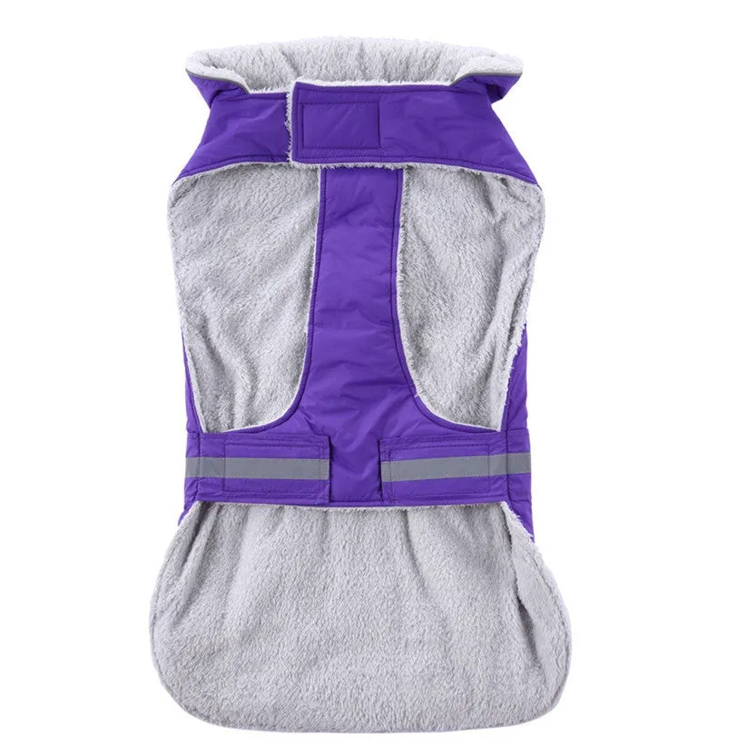 Reflective winter dog coat in pink, with harness holes, lay flat