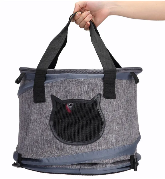 Fodable grey foldable pet carrier bag made of Oxford cloth, with top skylight and side storage pockets, 36x53cm size.