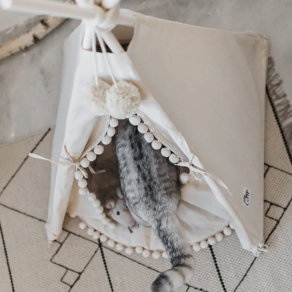 Canvas pet tent bed in teepee style with pine wood frame and removable cushion, suitable for cats and small dogs, size L shown.