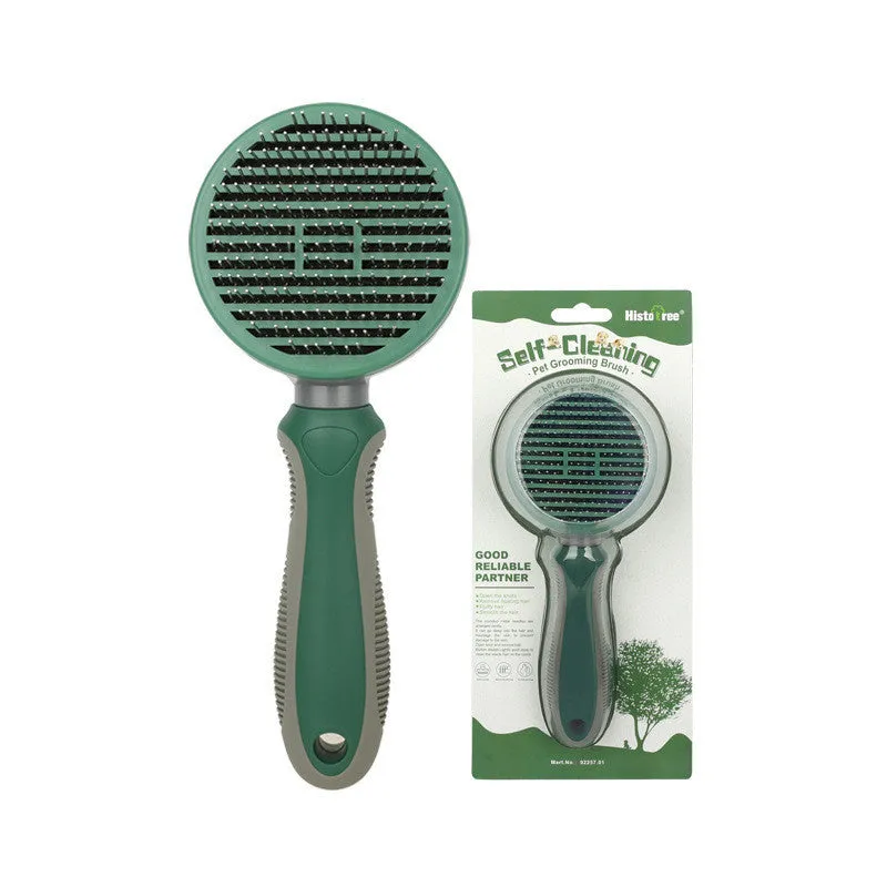 Automatic hair removal comb in green with stainless steel coarse needles, plastic and TPR body on white background