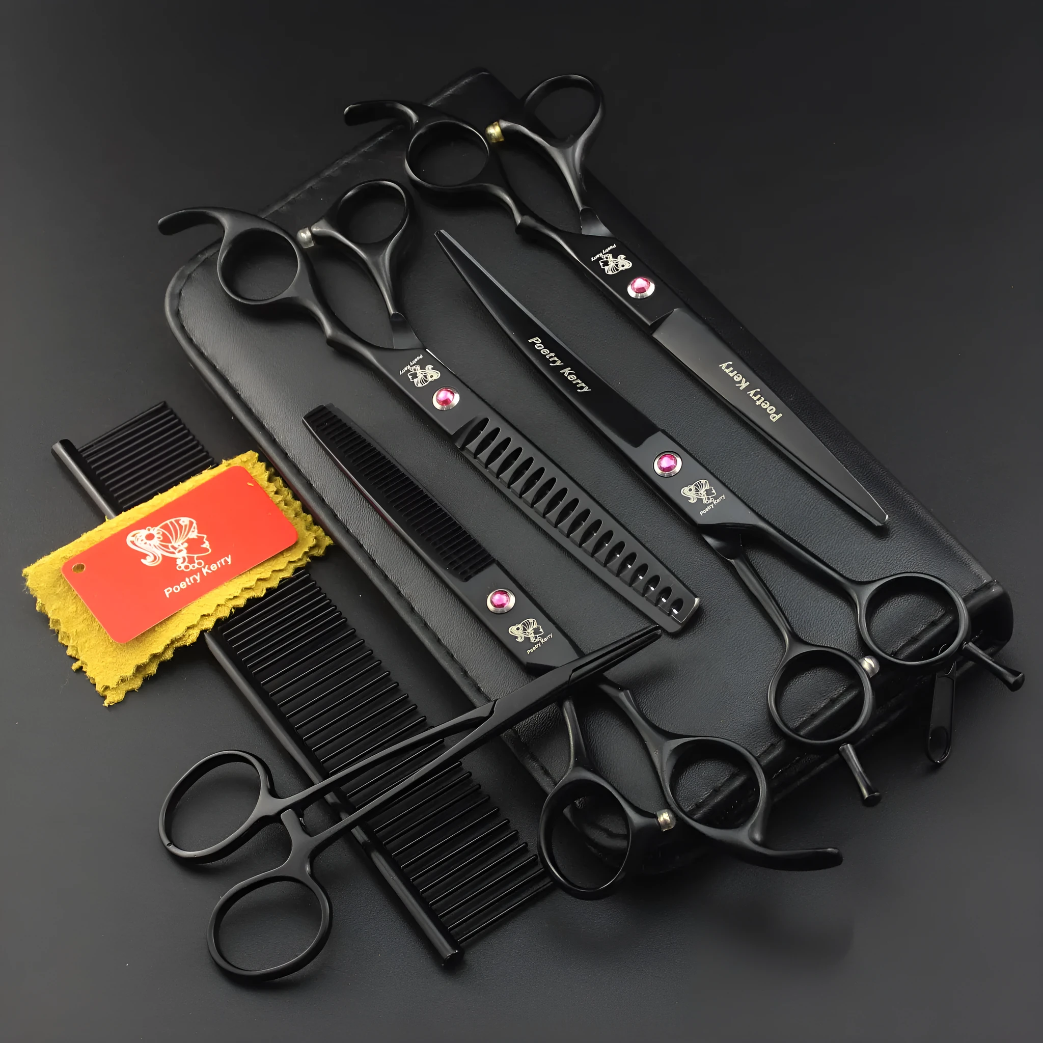 Pet grooming scissors set with straight, curved, and texturing blades in black stainless steel