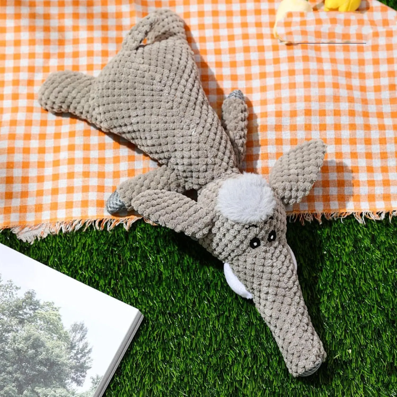 Animal-shaped plush dog toy with corn kernel texture for dental cleaning and squeeze-activated sound