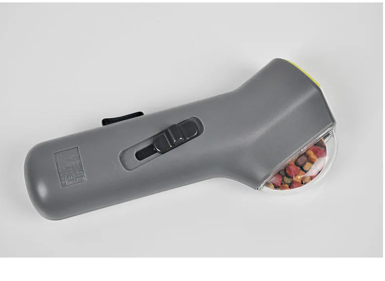 Grey PP dog training snack launcher with 18cm height on neutral background