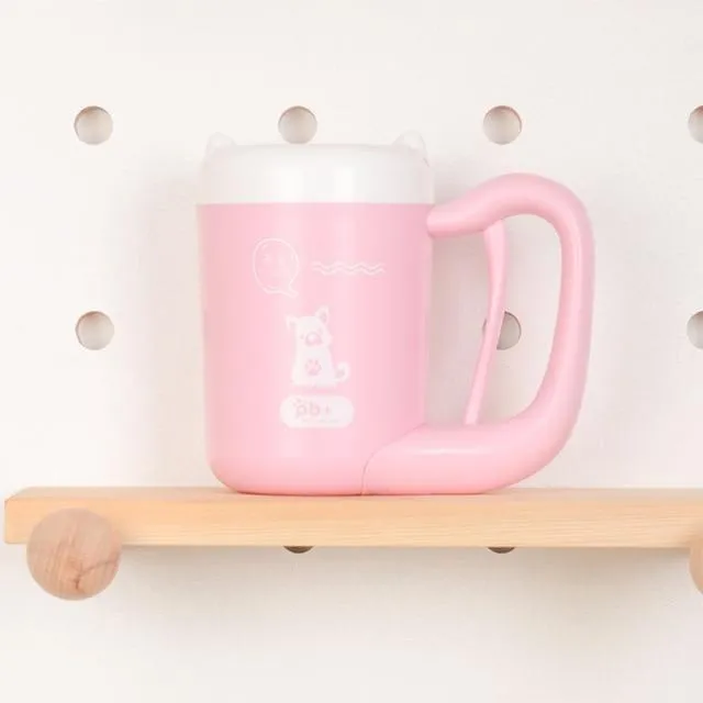 Pink pet paw cleaning cup with silicone brush and handle