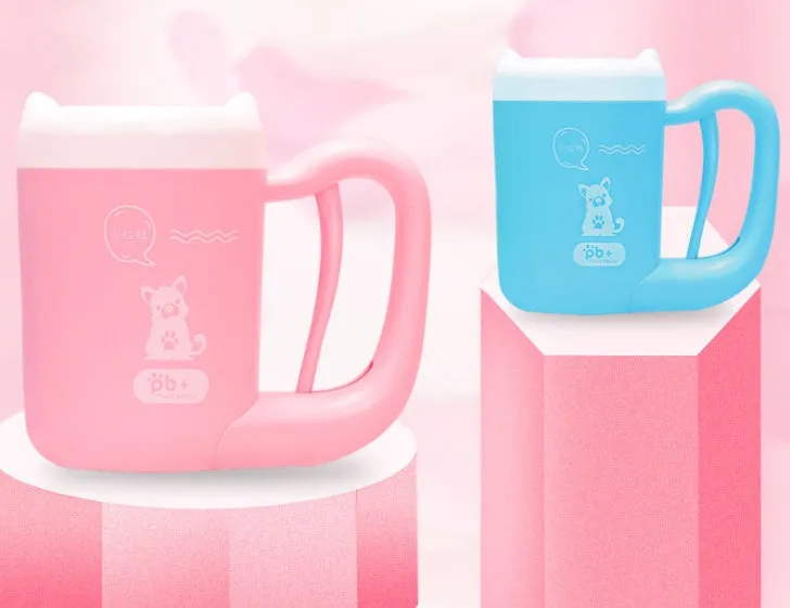 Pink pet paw cleaning cup with silicone brush and handle