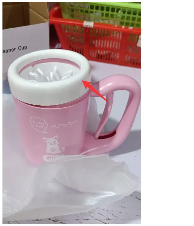 Pink pet paw cleaning cup with silicone brush and handle