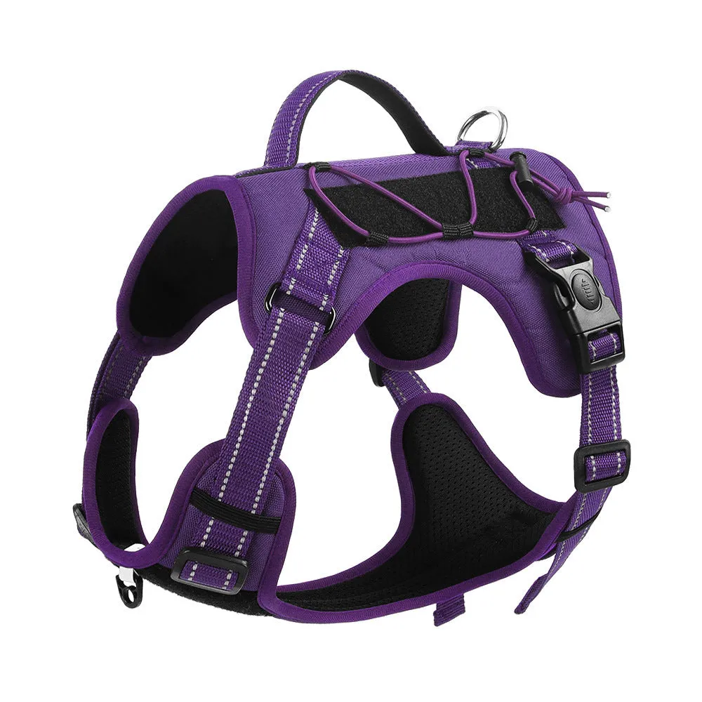 Orange reflective dog harness with padded chest strap and matching black rope lead laid flat.