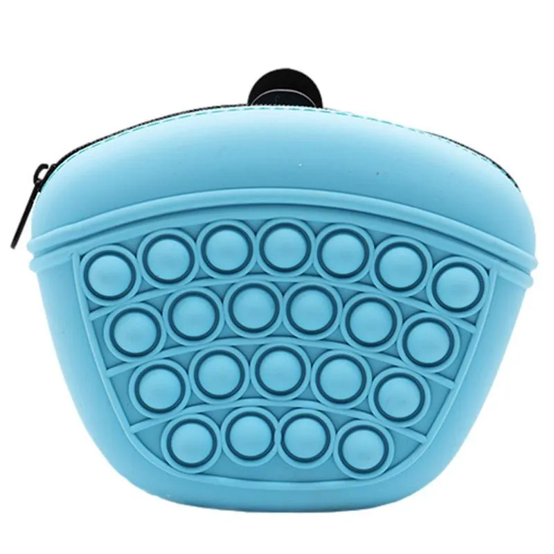 Blue silicone dog training treat pouch with magnetic closure and waist clip on a belt
