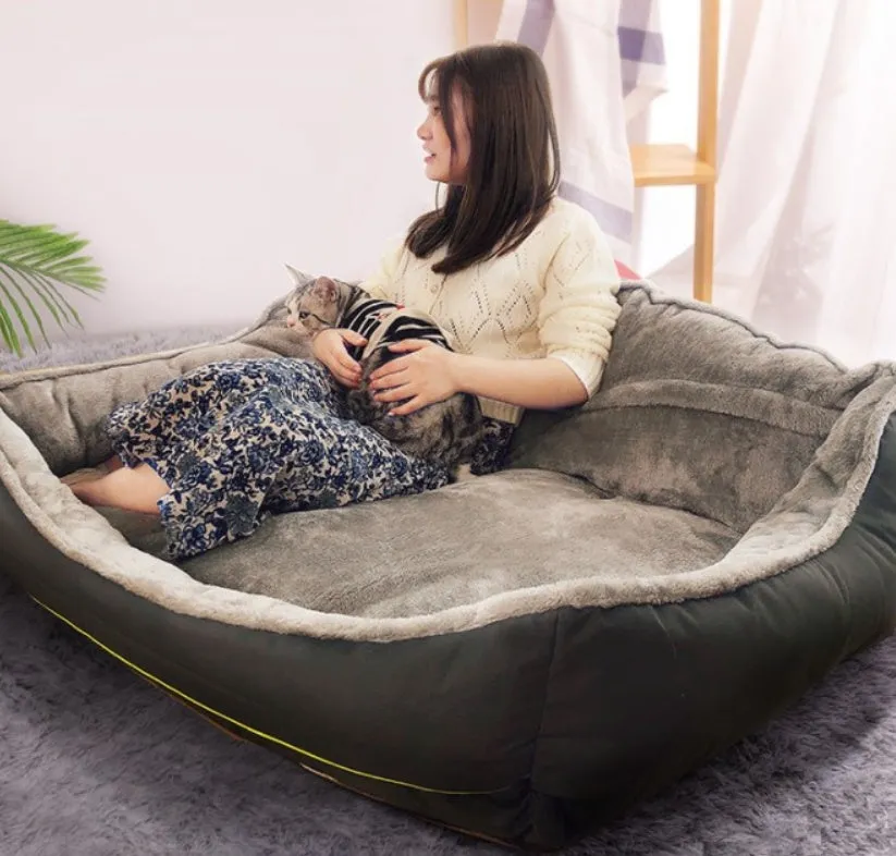 Grey polyester dog sofa bed with raised sides in XL size 120x90xH43cm on floor