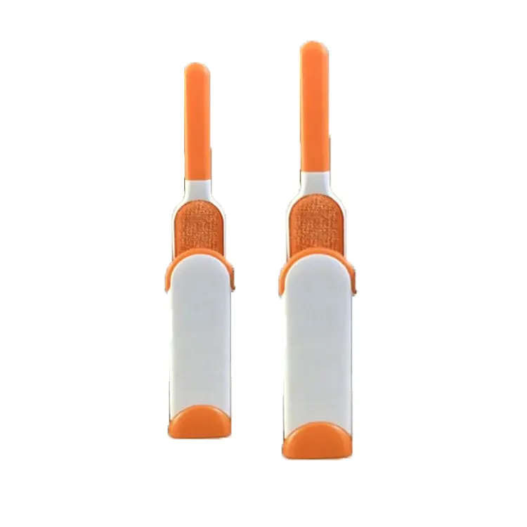 Reusable cat dog hair removal comb with self-cleaning base, double-sided extra-large lint brush on a sofa