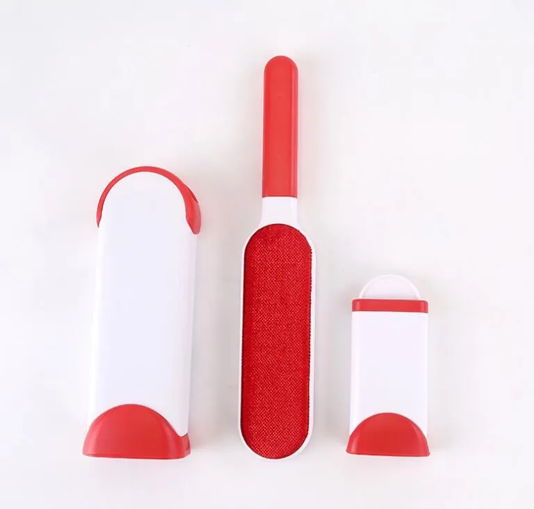 Reusable cat dog hair removal comb with self-cleaning base, double-sided extra-large lint brush on a sofa