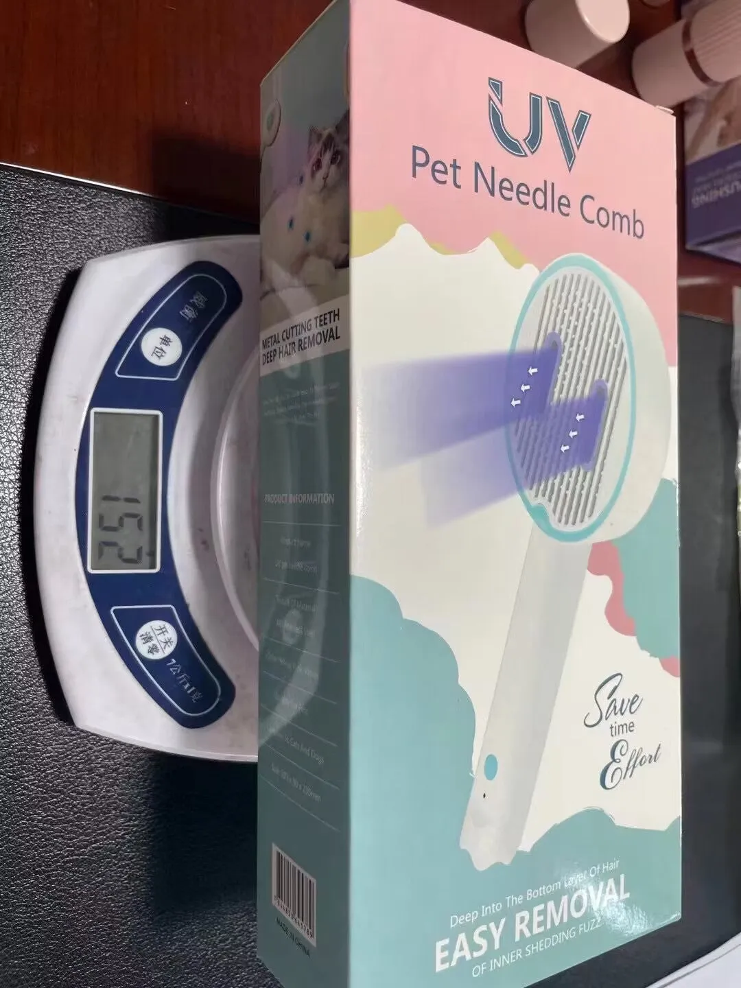 USB rechargeable UV sterilization pet comb for cats and dogs in pink, yellow, and white ABS plastic