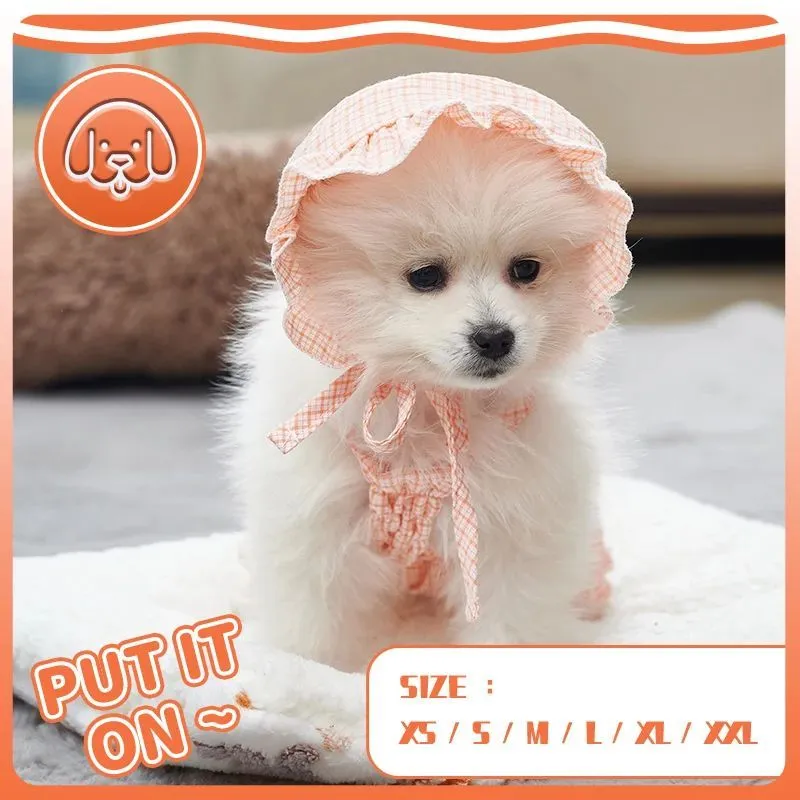 Orange dog jumpsuit with matching hat for small breeds like Yorkies and Chihuahuas, summer outdoor wear
