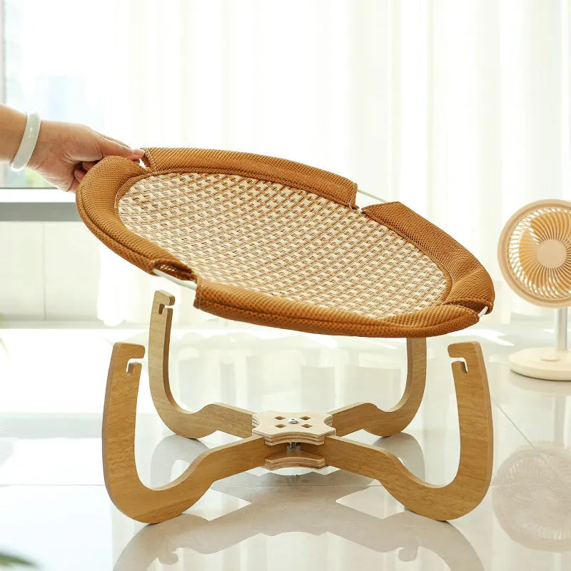Brown woven rattan pet hammock bed measuring 46 cm square with 17.5 cm high sides
