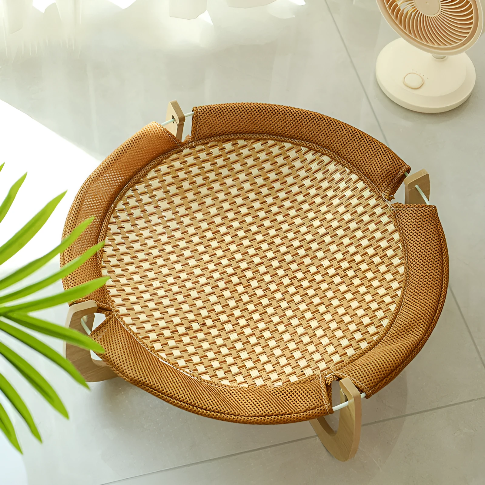 Brown woven rattan pet hammock bed measuring 46 cm square with 17.5 cm high sides