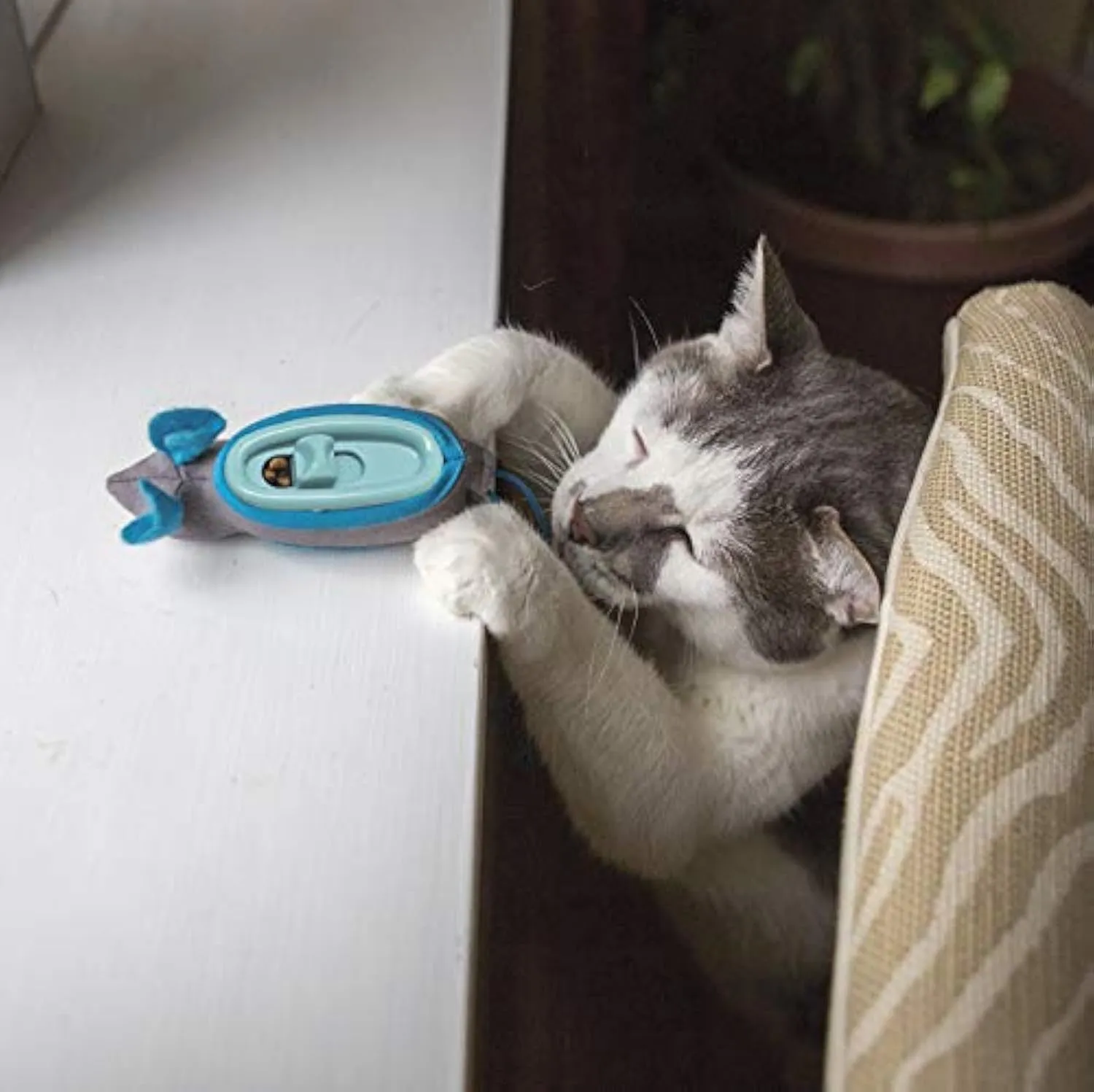 Blue interactive indoor treat dispenser mouse toy for cats with fabric skin and plastic feeder