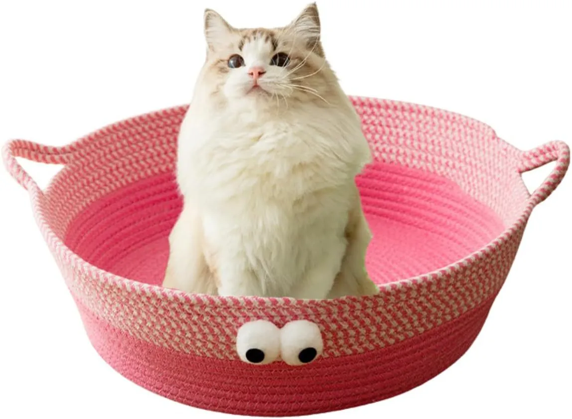Round woven natural cotton rope cat bed in green with spiral edge, size M, on wooden floor