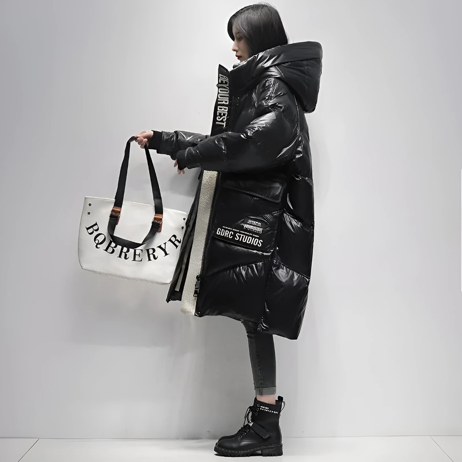 Women's ultra-thin mid-length down coat in black with long sleeves and loose fit, white duck down filling