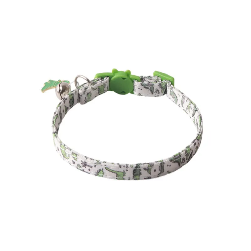 Peach skin fabric pet collar with metal accessories, 28cm long, in dinosaur or cake design