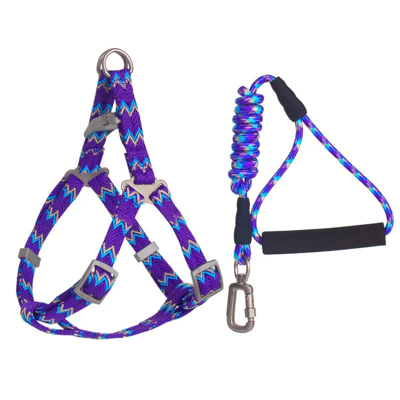Pet climbing harness in blue nylon with foam handle and circular rope, laid flat