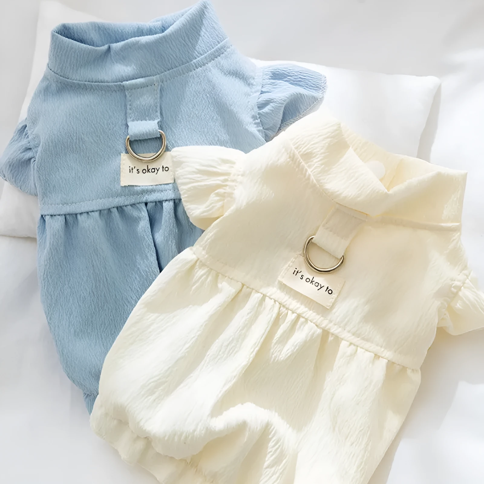Solid colour polyester flying sleeve dress for small dog in Bondi Blue with cloth label